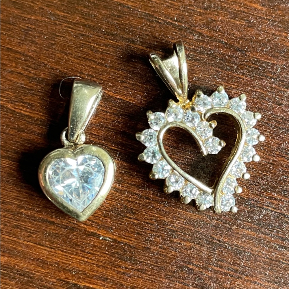 Two 925 sterling silver heart pendants